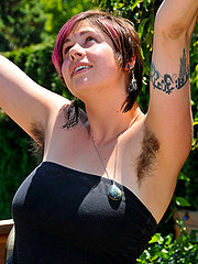 Full figured hippie girl with thick hairy pits and beautiful large breasts.